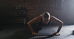 Active, woman and pushup for fitness at gym with exercise, strength training and workout. Female person, body balance and hard work for bodybuilding, core activity and resilience with strong muscle