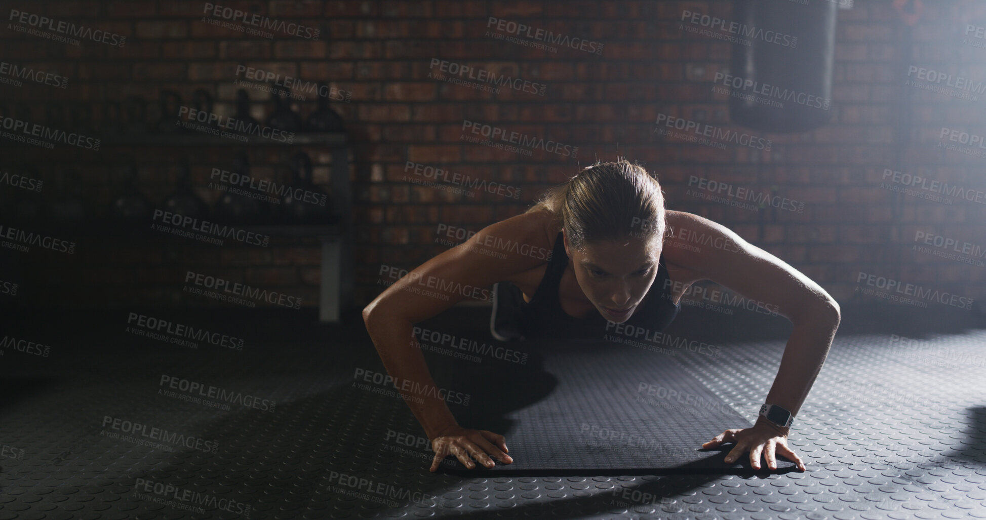 Buy stock photo Active, woman and pushup for fitness at gym with exercise, strength training and workout. Female person, body balance and hard work for bodybuilding, core activity and resilience with strong muscle