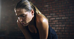 Breathe, exercise with woman in gym rest with sweat for workout, fitness and training. Sports, break and person with fatigue, burnout and exhausted for wellness, recovery and endurance challenge