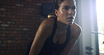 Fitness, tried and woman with breathing at gym for intense workout, exercise fatigue and sweating. Space, exhausted athlete and rest at sports center for wellness challenge, training burnout or break
