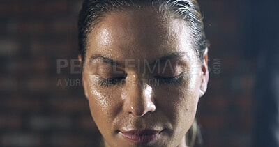 Buy stock photo Fitness, sweating and face of woman at gym with intense workout, exercise recovery and performance. Athlete, training break and resting at sports center for wellness challenge, endurance and progress