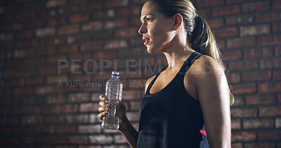 Buy stock photo Thinking, water bottle and woman in gym, exercise and fitness with fatigue, wellness and thirsty. Healthy person, reflection or athlete with hydration, liquid or aqua with workout, detox or challenge