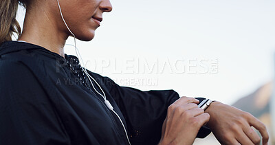 Buy stock photo Runner, smart watch and progress with hands and woman for performance stats, location tracking and fitness. Music, stopwatch timer and workout with person and earphones in city for heart rate monitor
