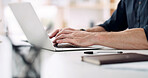 Business, hands and man with laptop, typing and research for article, email and internet. Closeup, person and journalist in office, pc and search for website information, connection and news reporter