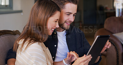 Buy stock photo Happy, couple and people with tablet, house and planning for trip, together and talk in living room. Bonding, man and chat with woman, smile and purchase of tickets or booking flight on web in home
