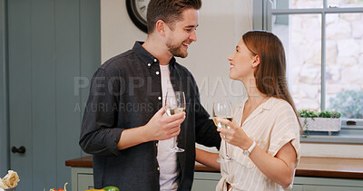 Buy stock photo Happy, talking and couple with wine in home to celebrate anniversary, bonding and relationship. Relax, love and man with woman embrace with drink for conversation, commitment and romance in house