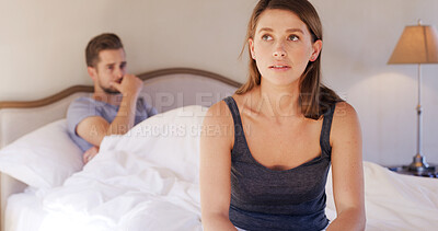 Buy stock photo Upset, woman and couple in bedroom, breakup or thinking of betrayal, sad or marriage regret in home. Cheating, spouse and reflection for divorce, mental health and people in toxic relationship