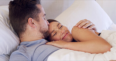 Buy stock photo Kiss, happy and couple in bed in morning for bonding, relaxing and resting on weekend together. Home, bedroom and man with woman for wake up, comfortable and embrace with love, affection and care