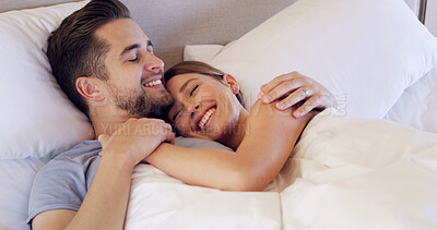 Buy stock photo Hug, happy and couple in bedroom in morning for bonding, relationship and resting on weekend together. Home, bed and man with woman for wake up, relaxing and embrace with love, affection and care