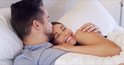 Buy stock photo Forehead, kiss and couple in bed in morning for bonding, relationship and resting on weekend together. Home, bedroom and man with woman for waking up, relax and embrace with love, affection and care