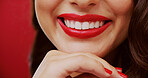 Teeth, lipstick and woman in studio for beauty, makeup and cosmetology with smile on background. Red lips, happy female person with glamour or color for luxury cosmetics with aesthetic or whitening