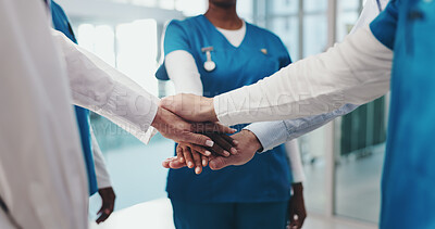 Buy stock photo Hands stack, doctors and team in hospital with motivation, circle and healthcare services in corridor. People, nurse and surgeon in group huddle with support, collaboration and meeting at clinic
