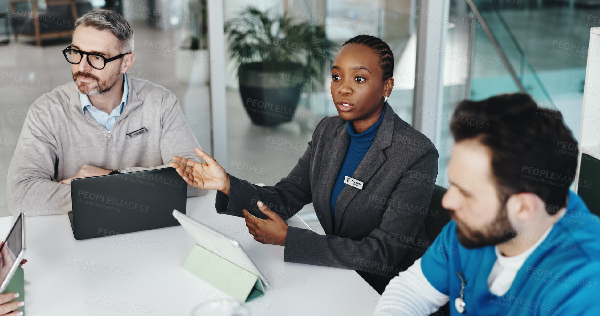 Buy stock photo Doctors, nurses and meeting with tablet in clinic for medical results, surgery schedule and update. Above, people and healthcare staff with tech for hospital budget, teamwork and treatment planning