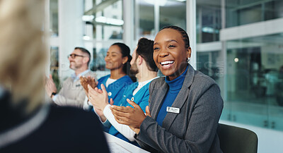 Buy stock photo Woman, doctors and applause with group at meeting, smile or success with announcement at wellness clinic. People, medical staff and happy team with thanks, celebration or goals in hospital boardroom