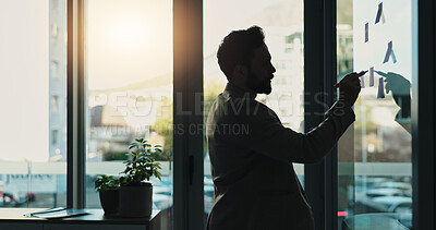 Buy stock photo Business, man and writing notes on glass for planning, ideas and reminders of schedule update. Male person, window and brainstorming for task goals, information and company agenda of project deadline