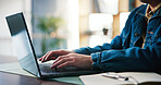 Business person, hands and typing on laptop in office for editing draft, publication and research. Media agency, creative and journalist with tech for submission, writing article and editor feedback