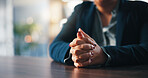 Woman, hands and praying at desk in home for job opportunity, request or professional guidance. Bokeh, space and spiritual person with faith in God for career development, religion or hope for growth
