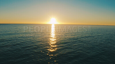 Buy stock photo Sunset, sky and landscape of ocean with waves for travel destination, holiday location and mockup. Space, sea and horizon in natural environment with dusk scenery, beach ripples and vacation