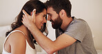 Forehead, love and smile of couple in bedroom of home together for bonding, moment or safety. Connection, security or trust with man and woman in apartment for anniversary, honeymoon or romance