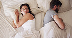 Couple, fight and woman with man sleeping in bed, conflict or marriage issue with trouble or upset at home. Awake, annoyed or angry female person with husband in bedroom, frustrated or moody in house
