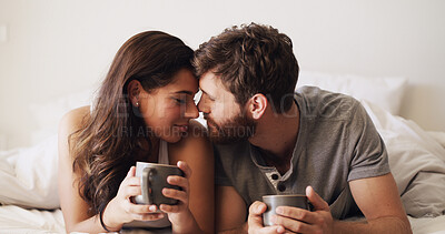 Buy stock photo Couple, forehead and tea in bed with calm, moment and connection for bonding in home. Woman, man and smile for romance, morning drink and rest with commitment peace, trust and comfort in bedroom