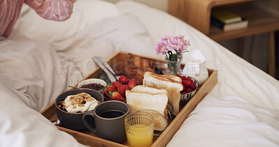 Buy stock photo Person, food tray and bed with breakfast for healthy diet, anniversary or room service. Morning, meal and fruit with juice, toast or cereal in bedroom for valentines day, catering or accommodation