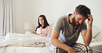 Frustrated couple, headache or argument with stress in bed for breakup, conflict or disagreement. Upset man, woman or toxic relationship with dispute in bedroom for divorce or cheating affair in home