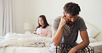 Frustrated couple, fight or conflict with stress in bed for breakup, quarrel or argument. Upset man, woman or toxic relationship with guilt in bedroom for home dispute, divorce or cheating affair