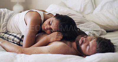 Buy stock photo Sleeping, couple and tired on bed, home or lazy on break on weekend, rest or comfortable in bedroom. Exhausted, man and cuddle with woman, relationship and relax together on mattress or care in house