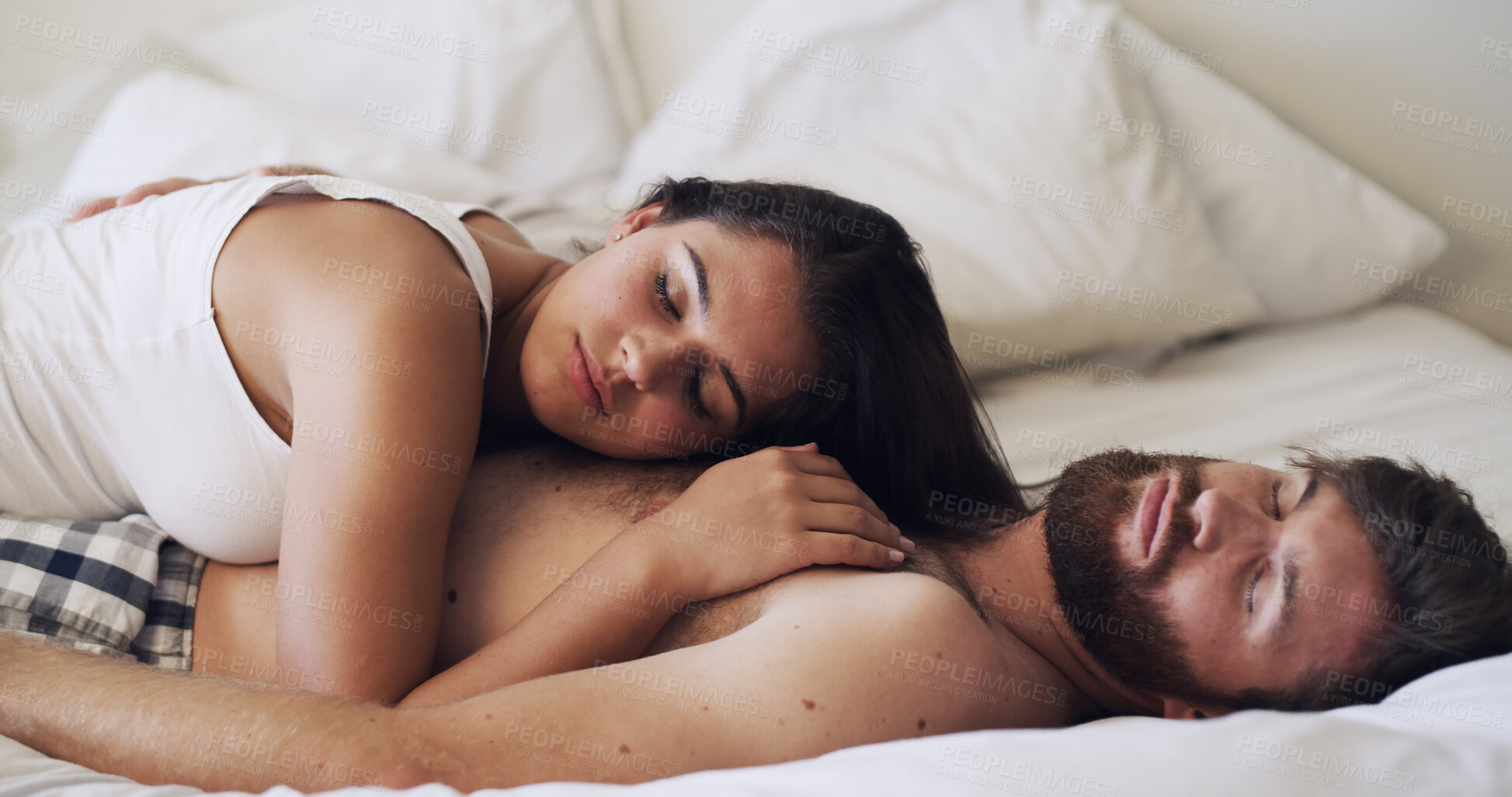 Buy stock photo Sleeping, couple and cozy on bed, home or lazy on break on weekend, rest and comfortable in bedroom. Exhausted, man and cuddle with woman, relationship and relax together on mattress or care in house