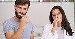 Dental portrait, couple and brushing teeth in bathroom for morning routine, fresh breath and hygiene. Oral care, people and toothbrush in home for cleaning mouth, plaque removal and bonding together