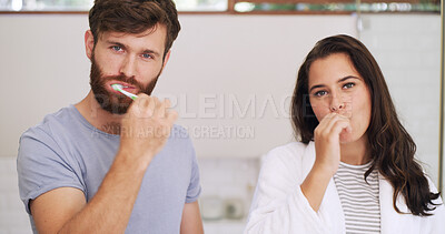 Buy stock photo Dental portrait, couple and brushing teeth in bathroom for morning routine, fresh breath and hygiene. Oral care, people and toothbrush in home for cleaning mouth, plaque removal and bonding together