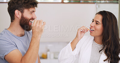 Buy stock photo Dental, couple or happy with brushing teeth in bathroom for morning routine, fresh breath or health. Oral hygiene, people and toothbrush in home for cleaning mouth, plaque removal or bonding together
