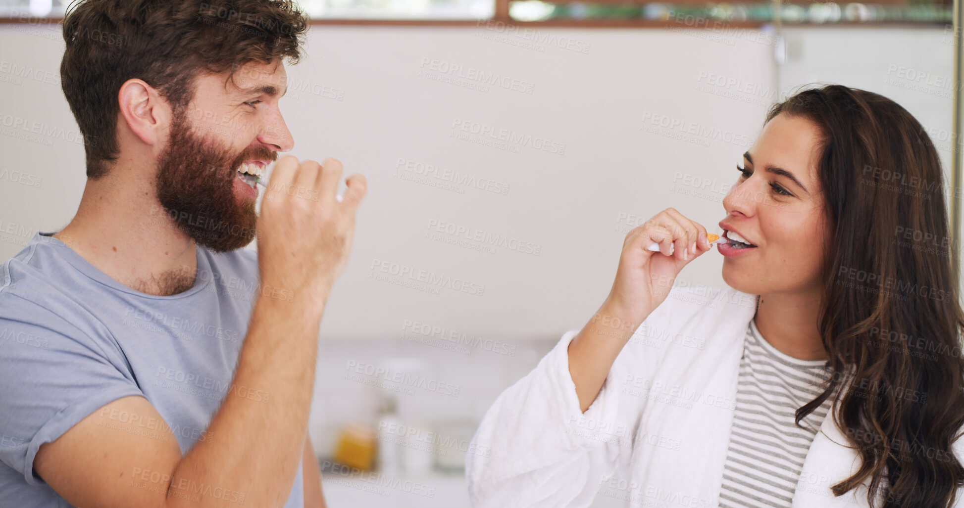 Buy stock photo Dental, couple or happy with brushing teeth in bathroom for morning routine, fresh breath or health. Oral hygiene, people and toothbrush in home for cleaning mouth, plaque removal or bonding together