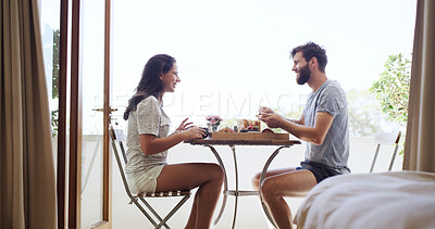 Buy stock photo Breakfast, laughing and romance with couple on balcony of home together for bonding or hunger. Love, morning and smile with happy people outdoor at apartment for anniversary or honeymoon meal