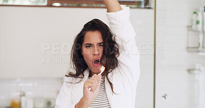 Buy stock photo Portrait, toothbrush and woman with energy, singing and dental health with music playlist. Home, oral hygiene and person with fun, wellness and routine with results, confidence and audio in bathroom