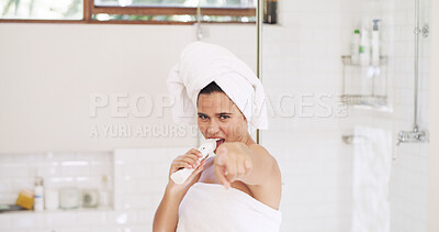 Buy stock photo Portrait, sing and towel with woman in bathroom of home for cleaning, hygiene or morning routine. Energy, fun and pointing with person in shower of apartment for fantasy karaoke or natural skincare