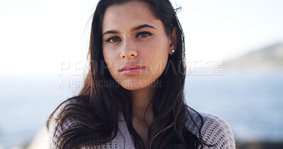 Buy stock photo Portrait, travel and woman at sea for vacation, summer trip and adventure in nature. Beach, tourist and serious person outdoor with confidence on holiday break at ocean on island in Australia