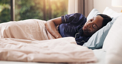 Buy stock photo Morning, relax and sleeping with black woman in bed of hotel for recovery, rest or time off. Dreaming, tired and wellness with African person lying in bedroom of resort for holiday accommodation