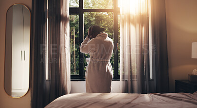 Buy stock photo Woman, back view and morning with stress in home for mental health, depression or insomnia. Female person, anxiety or pain with sleep deprivation by window curtains in robe for loneliness in house