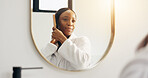 Mirror, bathroom and black woman with brush in morning for grooming, hygiene and routine in home. Happy, smile and person with hairbrush in reflection for beauty, self care and healthy texture