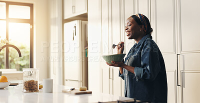 Buy stock photo Happy, woman and breakfast in kitchen, morning or start day with nutrition, cereal and healthy diet. Hungry, black person and eating with smile for meal, wellness and food for metabolism in home