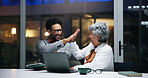 Happy, business people or night with high five or laptop in office for winning, success or teamwork. Businessman, woman and employees with smile or technology for achievement or project deadline