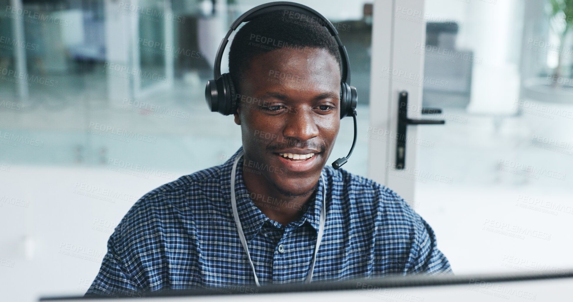 Buy stock photo Black man, listen and headset with computer at call centre for CRM, help client and customer support. Agent, mic and PC for consultation FAQ, inquiry advice and online information of telecom guidance