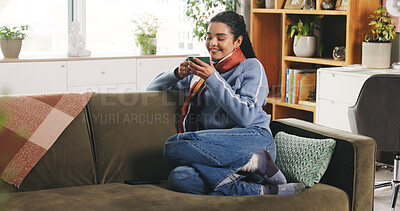 Buy stock photo Home, happy woman and thinking with coffee for relax, calm or peace in morning on weekend. Sofa, tea cup and female person with beverage, latte drink or reflection with daydream in living room