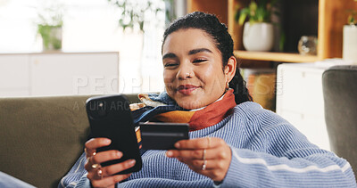Buy stock photo Credit card, phone and woman on sofa with online shopping, ecommerce or order on mobile app. Happy, debit and female person with cellphone for paying on internet banking in living room in house.