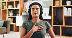 Woman, relax and audio therapy with headphones for zen, breathing exercise or technique in home. Female person, yoga and relaxation with sound or harmony for inner peace, mindfulness or life balance