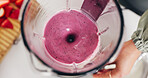 Person, hands and blender with pink smoothie above for diet, healthy drink or meal prep in home. Top view, nutritionist or mix with ingredients for natural organic beverage or milkshake in kitchen