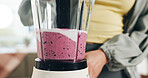 Woman, hands and blender with pink smoothie for diet, healthy drink or meal prep in home. Female person, nutritionist or mix with ingredients for natural organic beverage or milkshake in kitchen
