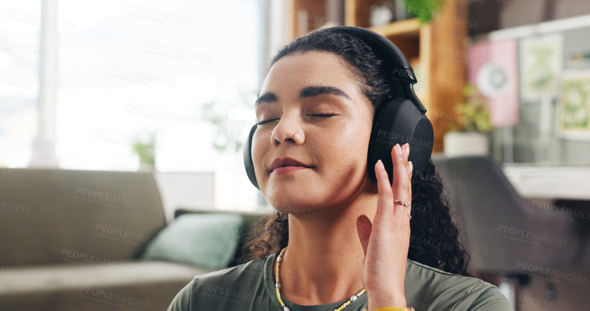 Buy stock photo Relax, peace and headphones with woman in home for streaming service, wellness podcast and mindset. Zen audio, meditation guide and calm sound with person in living room of apartment for music